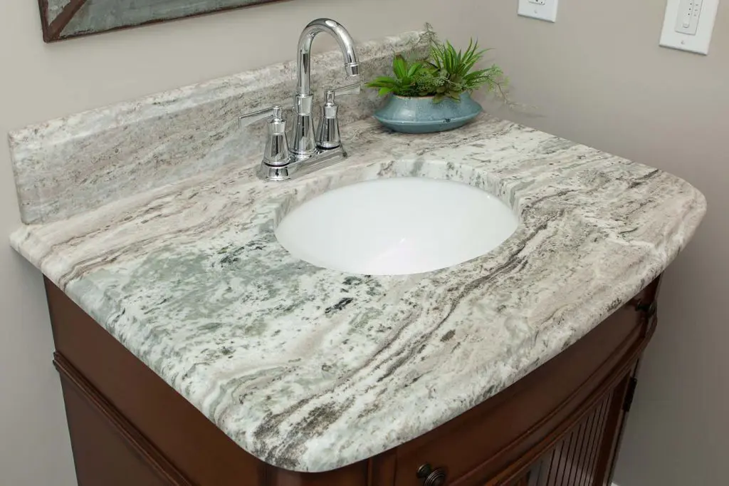 small bathroom vanity with white and grey countertop